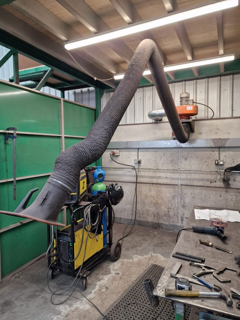Extracting fumes from a industrial unit